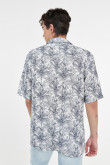 Camisa manga corta unicolor con estampados tropicales