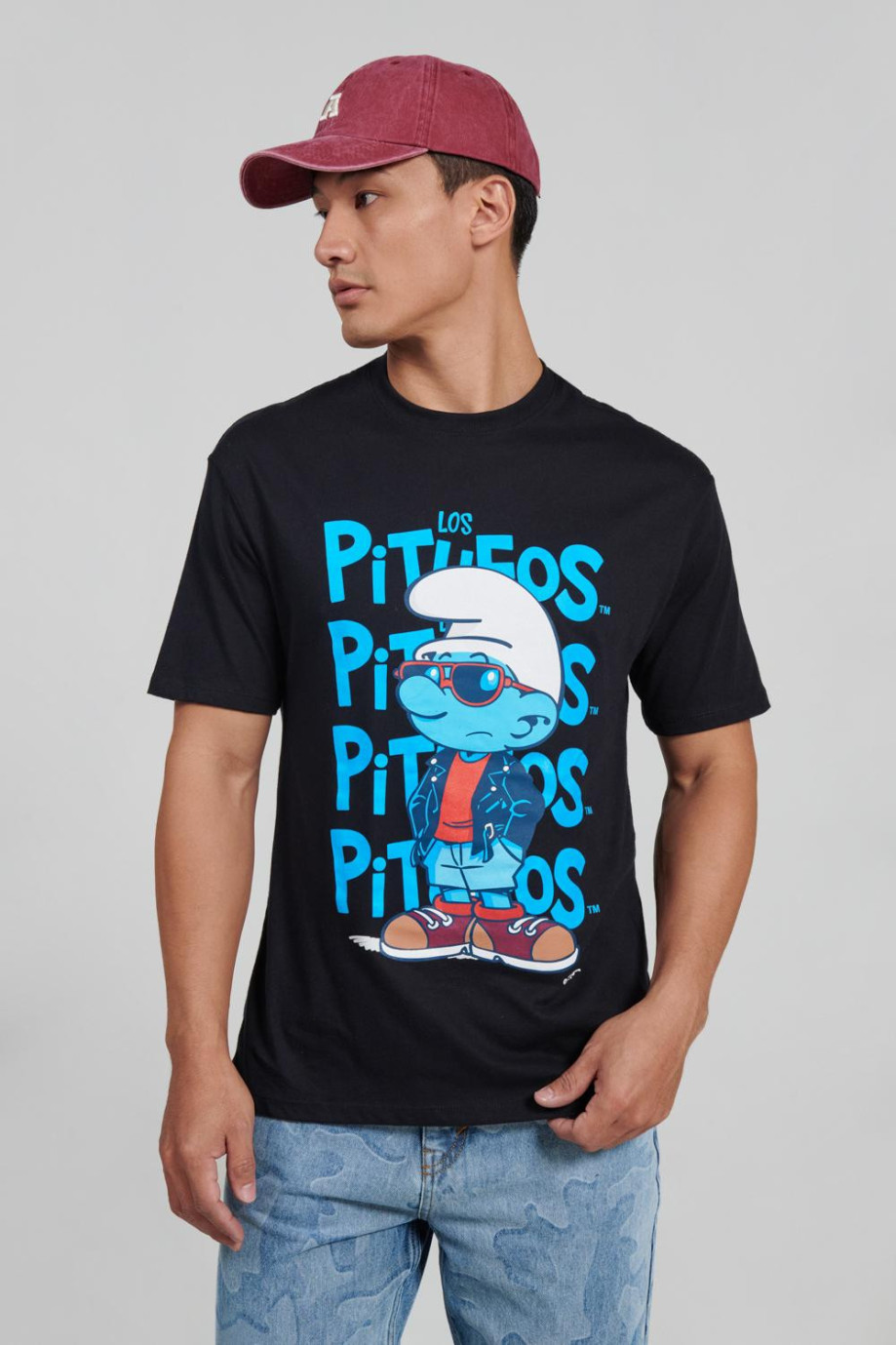 Camiseta manga corta azul intensa con diseño de Los Pitufos en frente