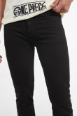 Jean negro slim con tiro bajo, 5 bolsillos y ajuste ceñido