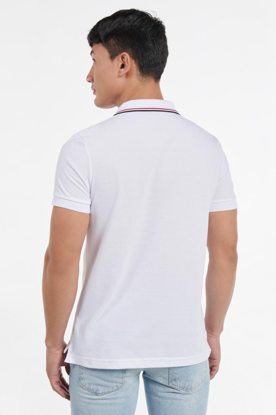 Camiseta polo manga corta unicolor con puños y cuello tejidos