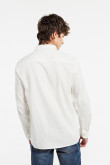 Camisa unicolor con bolsillo, manga larga y cuello sport