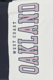 Camiseta oversize crema clara con cuello en V y texto college de Oakland
