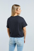 Camiseta crop top azul intensa con diseño de la Pequeña Lulú
