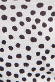 Camiseta crema clara con manga 3/4 y diseño de puntos negros