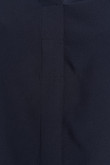 Blusa unicolor con manga corta, botones y cuello camisero