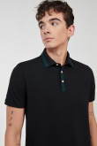 Camiseta polo unicolor con manga corta y cuello tejido