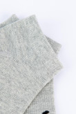 Medias tobilleras grises claras con diseño de la Pantera Rosa
