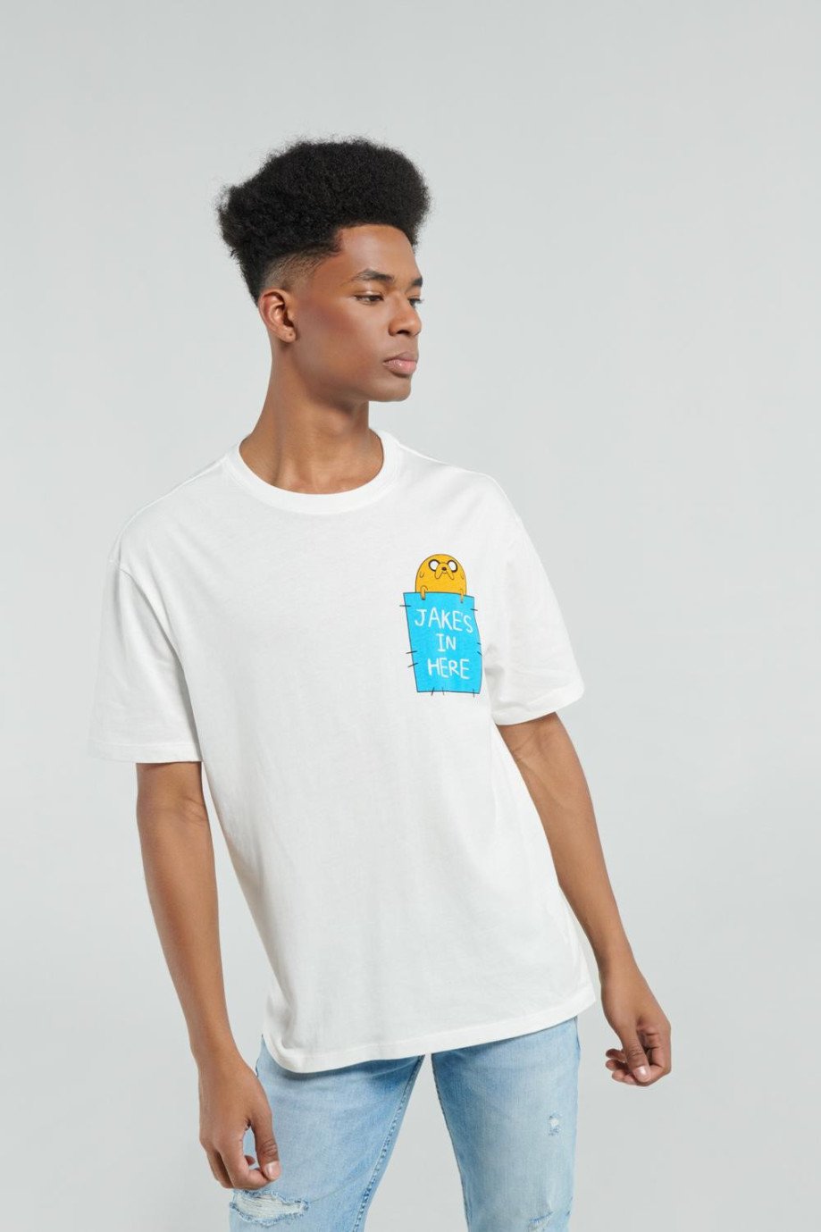 Camiseta unicolor oversize con diseño de Hora de Aventura y cuello redondo