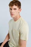 Camiseta manga corta unicolor con cuello redondo y bolsillo