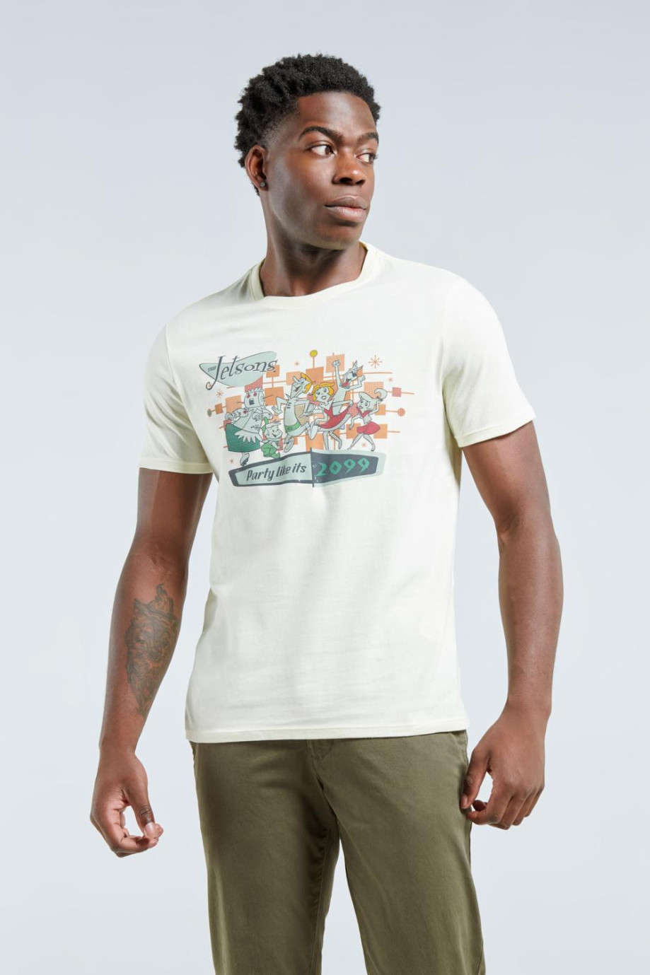 Camiseta crema con manga corta y diseño de Los Supersónicos