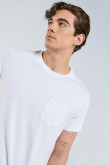 Camiseta unicolor en algodón con manga corta y bolsillo