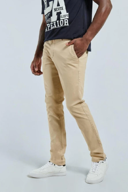 Pantalón en dril unicolor súper slim con tiro medio