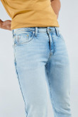 Jean tiro bajo skinny azul claro con desgastes y bolsillos