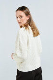 Suéter unicolor tejido con cuello redondo y hombro rodado