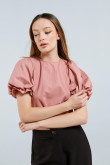 Blusa rosada clara con manga corta aglobada y espalda descubierta