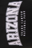 Camiseta negra en algodón con cuello redondo y arte college
