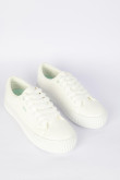 Tenis casuales blancos con contrastes verdes y suelas planas