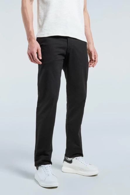 Pantalón en dril slim unicolor con bolsillos y tiro medio