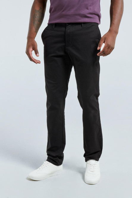 Pantalón unicolor slim en dril con tiro medio y bota recta