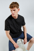 Camiseta en algodón unicolor con manga corta y cortes
