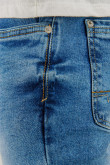 Jean azul claro skinny con desgastes de color y rotos