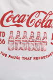Camiseta crop top oversize blanca con diseño rojo de Coca-Cola en frente