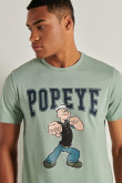 Camiseta verde con diseño de Popeye en frente y manga corta