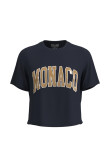 Camiseta crop top unicolor con diseño college de Mónaco en frente