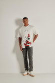 Camiseta oversize crema con diseño de Goofy y manga corta