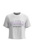Camiseta unicolor crop top con diseño college de France en frente