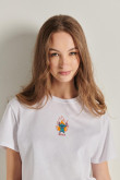 Camiseta blanca crop top con manga corta y diseño de Stitch
