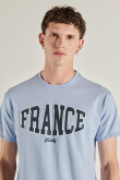 Camiseta azul con diseño college de France y manga corta