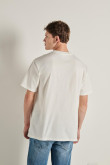 Camiseta unicolor oversize con hombro rodado y manga corta