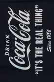 Camiseta en algodón cuello redondo unicolor con diseño de Coca-Cola