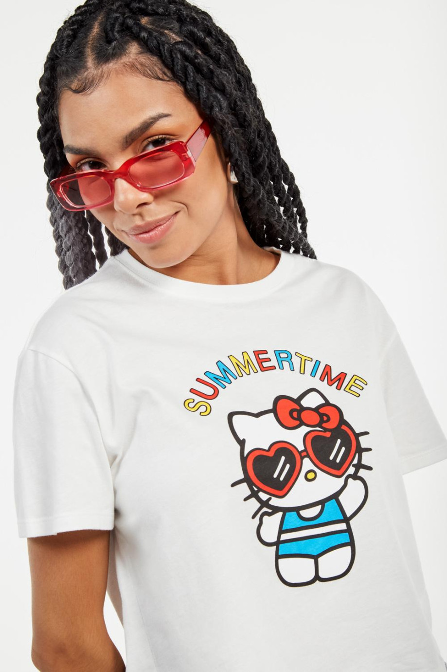 Camiseta crema clara crop top con estampado de Hello Kitty y cuello redondo