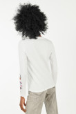 Camiseta crema claro manga larga con diseños estampados