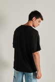 Camiseta unicolor oversize con texturas y cuello redondo