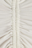 Blusa blanca manga larga con escotes y recogido en frente