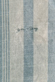 Camisa manga larga unicolor a rayas con bordado decorativo