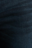 Jean azul tiro bajo skinny ajustado con costuras cafés