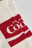 Medias tobilleras unicolores con contrastes y diseños de Coca-Cola