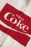 Medias tobilleras unicolores con contrastes y diseños de Coca-Cola