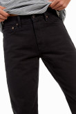Jean negro tipo 90´S con botas rectas y tiro bajo