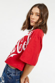 Camiseta crop top roja oversize con estampado de Coca-Cola