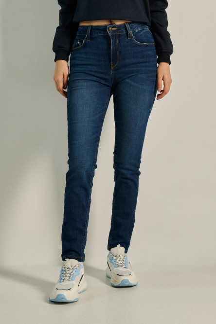 Jean jegging ajustado azul oscuro con tiro alto y bolsillos