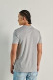 Camiseta manga corta unicolor con diseño college delantero