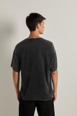 Camiseta oversize negra estampada con manga corta en algodón