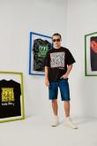 Camiseta manga corta negra oversize y diseño de Keith Haring