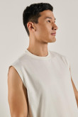 Camiseta en algodón unicolor oversize con manga sisa