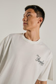 Camiseta estampada unicolor oversize con manga corta